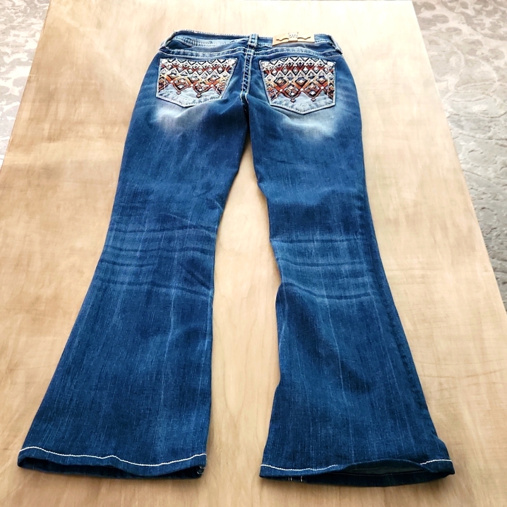 Mid rise flare Miss Me Jeans